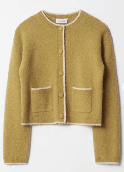 Boxy Crew-Neck Cardigan in mustard yellow with white trim and two front pockets